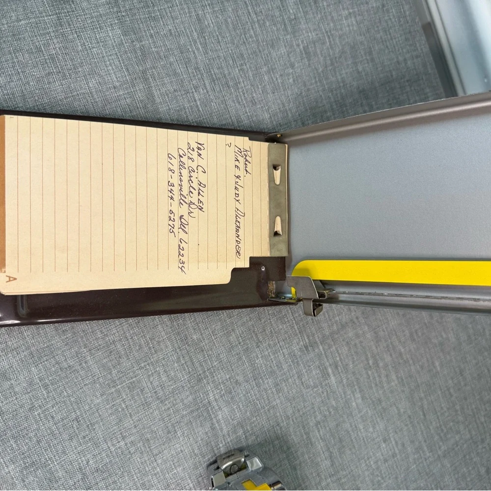 Source Unknown Yellow and Black Phone Index